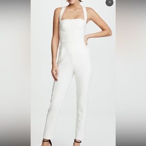 Structured white jumpsuit with cross back straps